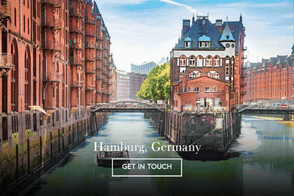 Animated image of Hamburg's Speicherstadt red-brick warehouses along a canal, 'Hamburg, Germany' with a Get In Touch button