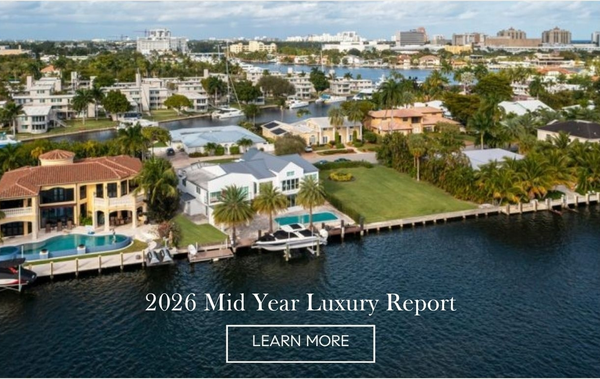 Aerial view of waterfront luxury estates with pools and boat docks, '2026 Mid Year Luxury Report' with a Learn More button