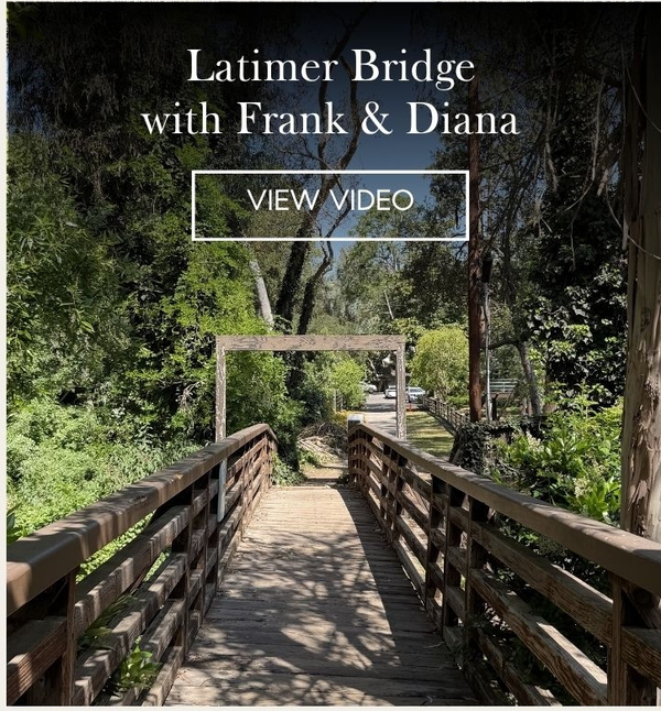 Wooden footbridge on Latimer Road in Rustic Canyon under a tree canopy, 'Latimer Bridge with Frank & Diana' and a View Video button