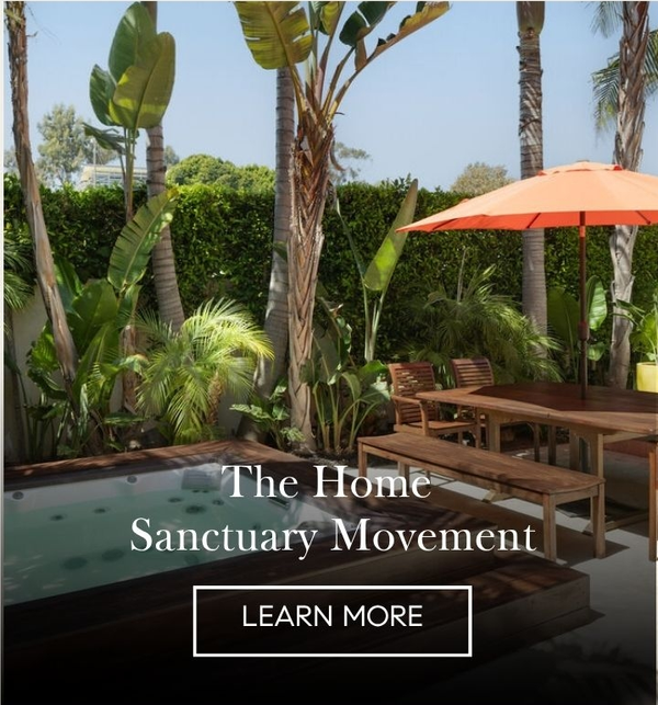 Tropical garden with a sunken spa, teak dining table and orange umbrella, 'The Home Sanctuary Movement' with a Learn More button